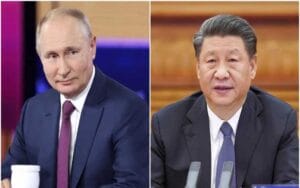 Chinese President Xi Jinping talks to Putin